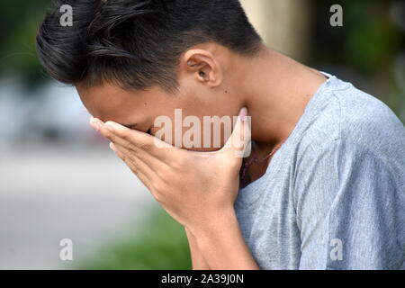 A Failed Young Asian Teenage Male Stock Photo