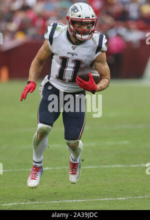 New England Patriots Rob Ninkovich (50) and WR Julian Edelman (R) celebrate  a Malcolm Butler interception of a Seattle Seahawks pass with 26 seconds  remaining in Super Bowl XLIX at University of