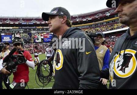 Landover, United States. 06th Oct, 2019. Washington Redskins head coach Jay Gruden walks toward midfield to greet New England Patriots head coach Bill Belichick after an NFL game at FedEx Field in Landover, Maryland, Sunday, October 6, 2019. New England won 33-7. Photo by David Tulis/UPI Credit: UPI/Alamy Live News Stock Photo