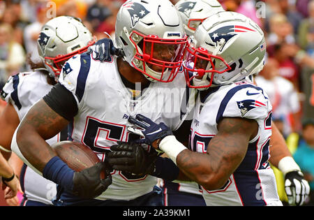 Landover, United States. 06th Oct, 2019. New England Patriots outside linebacker Jamie Collins (C) celebrates a Washington Redskins fumble and turnover during the first half of an NFL game at FedEx Field in Landover, Maryland, Sunday, October 6, 2019. Photo by David Tulis/UPI Credit: UPI/Alamy Live News Stock Photo
