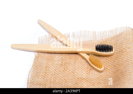 Bamboo tooth brush on white background Stock Photo