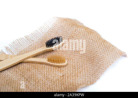 Bamboo tooth brush on white background Stock Photo
