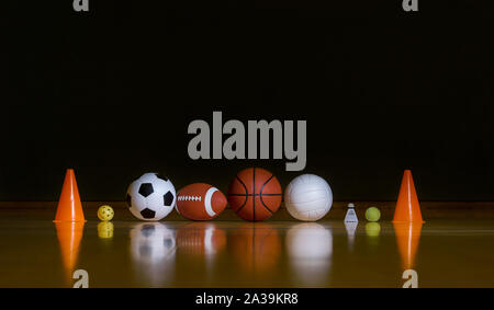 Close-up Of Various Sport Equipments Isolated On Black Background Stock Photo