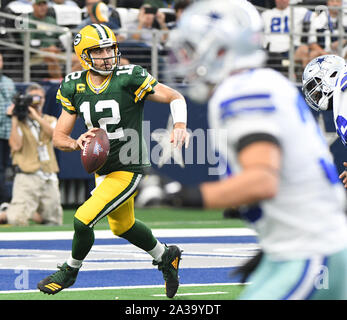 Arlington, United States. 06th Oct, 2019. Green Bay Packers Aaron Rodgers scrambles deep in his own territory during an NFL game against the Dallas Cowboys at AT&T Stadium in Arlington, Texas on Sunday, October 6, 2019. Photo by Ian Halperin/UPI Credit: UPI/Alamy Live News Stock Photo