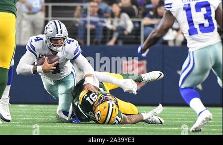 Arlington, United States. 06th Oct, 2019. Dallas Cowboys Dak Prescott gets sacked by Green Bay Packers Preston Smith during their NFL game AT&T Stadium in Arlington, Texas on Sunday, October 6, 2019. Photo by Ian Halperin/UPI Credit: UPI/Alamy Live News Stock Photo