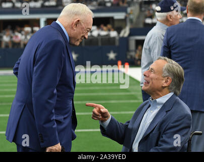 Arlington, United States. 06th Oct, 2019. Dallas Cowboys owner Jerry Jones, left, talks to Texas Governor Greg Abbott prior to the Green Bay Packers NFL game AT&T Stadium in Arlington, Texas on Sunday, October 6, 2019. Photo by Ian Halperin/UPI Credit: UPI/Alamy Live News Stock Photo