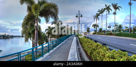 Dark clouds over Herbert R. Savage bridge, over Savage Pass, at the entrance of Marco Island, Naples, Florida Stock Photo