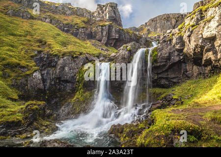 Beautiful cascading pools at Klifbrekku waterfalls in Eastern Iceland Stock Photo