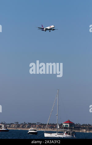 FedEx Express 757 performing at The Great Pacific Airshow Huntington Beach California USA. the largest airshow in the USA Stock Photo