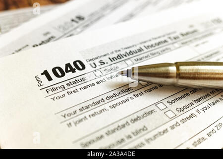 Form 1040 must be filled out in April as the deadline to pay individual taxes. Stock Photo