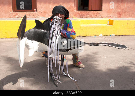 Venezuelan dancing devils of Naiguata in costumes representing fishes UNESCO Intangible Cultural Heritage on Corpus Christi day Stock Photo