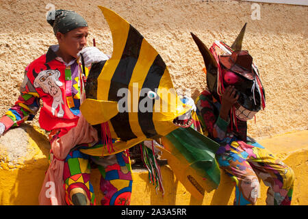 Venezuelan dancing devils of Naiguata in costumes representing fishes UNESCO Intangible Cultural Heritage on Corpus Christi day Stock Photo