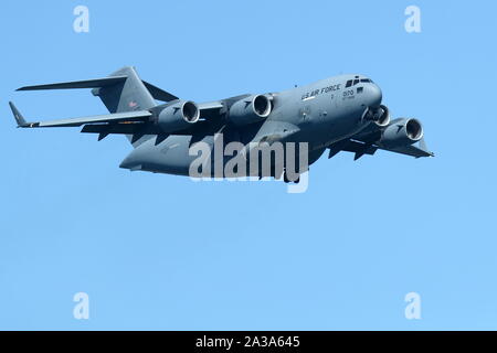 Boeing C-17 Globemaster III flying during the Great Pacific Airshow in Huntington Beach, California on October 4, 2019 Stock Photo