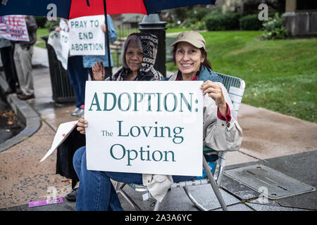 West Reading, Pennsylvania/USA – October 6, 2019: Life Chain Event: Heavy rain does not deter two senior women from participating in right to life, an