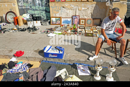 Vendor at ' Il Mercato delle Pulci' ,Palermo's used items market located in the Albergheria District near the Ballaro Street Market. Palermo, Sicily, Stock Photo