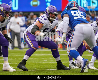 Minnesota Vikings offensive guard Josh Kline (64) sets to block