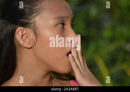 An A Teenager Girl Yawning