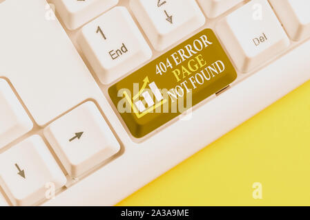 Conceptual hand writing showing 404 Error Page Not Found. Concept meaning Webpage on Server has been Removed or Moved White pc keyboard with note pape Stock Photo