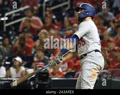 Washington, United States. 06th Oct, 2019. Los Angeles Dodgers Russell Martin watches his two-run home run against the Washington Nationals in the ninth inning during the National League Division Game Three at Nationals Park in Washington, DC on October 6, 2019. Washington and Los Angeles enter game three tied 1-1 in the five-game series. Photo by Pat Benic/UPI Credit: UPI/Alamy Live News Stock Photo