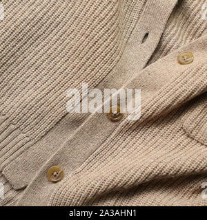 Cozy knitted sweater cardigan texture background. Autumn winter concept Stock Photo