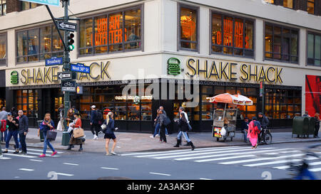 Shake Shack, 1333 Broadway, New York, NY. exterior storefront of a fast casual restaurant in midtown Manhattan.