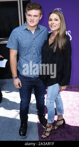 CENTURY CITY, LOS ANGELES, CALIFORNIA, USA - OCTOBER 06: David Vincent Turco and Paige Turco arrive at the World Premiere Of MGM's 'The Addams Family' held at the Westfield Century City AMC on October 6, 2019 in Century City, Los Angeles, California, United States. (Photo by Xavier Collin/Image Press Agency) Stock Photo