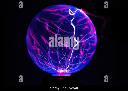Electricity fire-ball. Abstract photo of electric waves. Static electricity - Stock Image