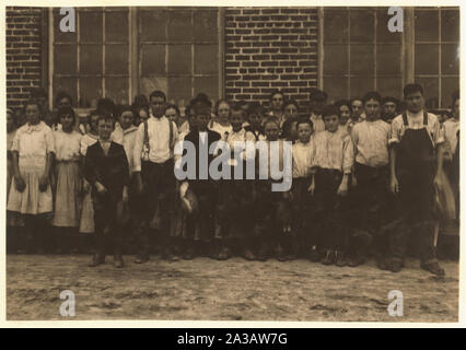 Shaw Cotton Mills. Overseer grouped all the workers, and several of them are surely under 13, and several began work under 13 last year. Stock Photo