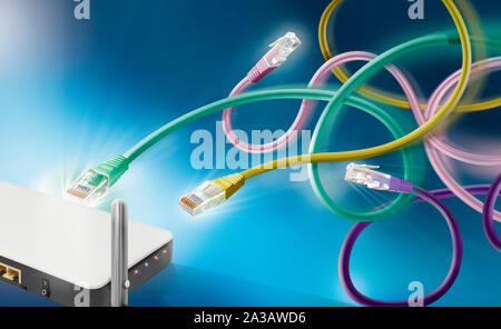 Ethernet connection cables competing for access to computer modem Stock Photo