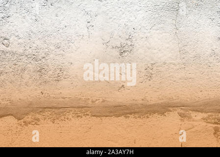 Old concrete surface close-up. Abstract background brown color toned Stock Photo