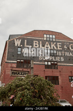 Portland, Maine - September 26th, 2019: Historic W.L. Blake & Co Mill and Industrial Supplies, brick building in Old Port district of Portland. Stock Photo