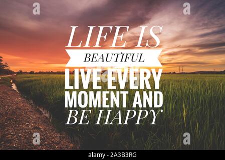 Motivational and inspirational quote - Life is beautiful live every moment and be happy. Stock Photo