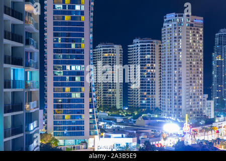 Night view of Surfers Paradise highrise buildings (including the Chevron Renaissance, Hilton Hotel and Mantra Circle on Cavill) on the Gold Coast of Q Stock Photo