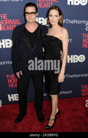 (FILE) Angelina Jolie talks Brad Pitt divorce: 'I felt a deep and genuine sadness'. MANHATTAN, NEW YORK CITY, NEW YORK, USA - MAY 12: Actors Brad Pitt (wearing Greg Lauren) and Angelina Jolie Pitt (wearing Saint Laurent dress and shoes) arrive at the New York Premiere of HBO's 'The Normal Heart' held at the Ziegfeld Theater on May 12, 2014 in Manhattan, New York City, New York, United States. ( Credit: Image Press Agency/Alamy Live News Stock Photo