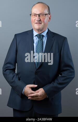 Dresden, Germany. 01st Oct, 2019. Norbert Mayer (AfD) stands in front of a photo wall on the occasion of the constituent session of the state parliament. Credit: Sebastian Kahnert/dpa-Zentralbild/ZB/dpa/Alamy Live News Stock Photo