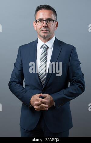 Dresden, Germany. 01st Oct, 2019. Sören Voigt (CDU) stands in front of a photo wall on the occasion of the constituent session of the state parliament. Credit: Sebastian Kahnert/dpa-Zentralbild/ZB/dpa/Alamy Live News Stock Photo