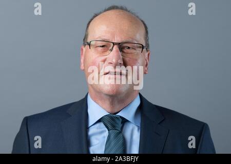Dresden, Germany. 01st Oct, 2019. Norbert Mayer (AfD) stands in front of a photo wall on the occasion of the constituent session of the state parliament. Credit: Sebastian Kahnert/dpa-Zentralbild/ZB/dpa/Alamy Live News Stock Photo