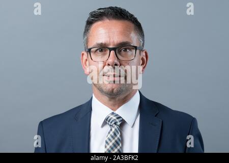 Dresden, Germany. 01st Oct, 2019. Sören Voigt (CDU) stands in front of a photo wall on the occasion of the constituent session of the state parliament. Credit: Sebastian Kahnert/dpa-Zentralbild/ZB/dpa/Alamy Live News Stock Photo