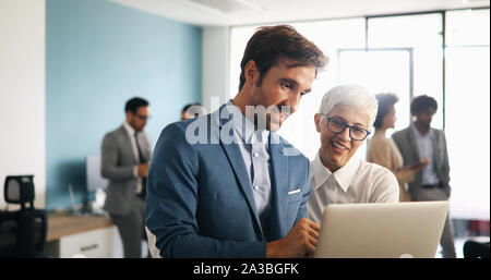 Successful business group of people at work in office Stock Photo
