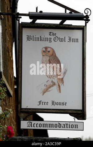 The Blinking Owl Inn sign, North Newington, Oxfordshire, England, UK Stock Photo
