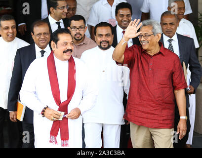 Colombo, Sri Lanka. 7th Oct, 2019. Sri Lankan presidential candidate and former defense chief Gotabaya Rajapaksa leaves the election commission with his brother and former president Mahinda Rajapaksa, left, after handing over nominations papers in Colombo, Colombo, Sri Lanka, Monday, October. 7, 2019. Credit: Pradeep Dambarage/ZUMA Wire/Alamy Live News Stock Photo