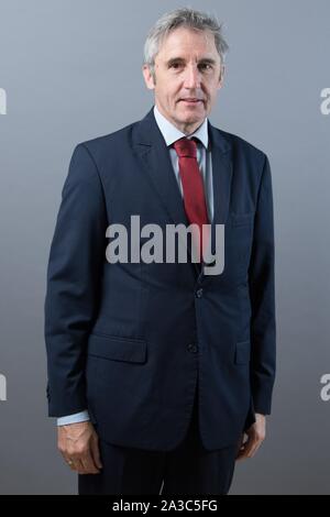 Dresden, Germany. 01st Oct, 2019. Frank Richter (SPD) is standing in front of a photo wall on the occasion of the constituent session of the Saxon state parliament. Credit: Sebastian Kahnert/dpa-Zentralbild/ZB/dpa/Alamy Live News Stock Photo
