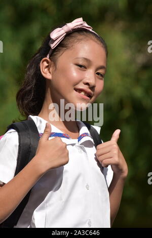 Proud Cute Diverse Girl Student With Notebooks Stock Photo