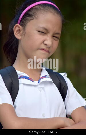 A Stubborn Youthful Asian Person Stock Photo