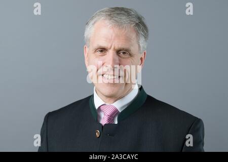 Dresden, Germany. 01st Oct, 2019. Peter Wilhelm Patt (CDU) stands in front of a photo wall on the occasion of the constituent session of the state parliament. Credit: Sebastian Kahnert/dpa-Zentralbild/ZB/dpa/Alamy Live News Stock Photo