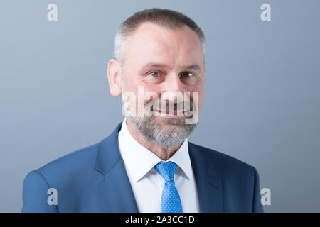 Dresden, Germany. 01st Oct, 2019. Marko Schiemann (CDU) stands in front of a photo wall on the occasion of the constituent session of the state parliament. Credit: Sebastian Kahnert/dpa-Zentralbild/ZB/dpa/Alamy Live News Stock Photo