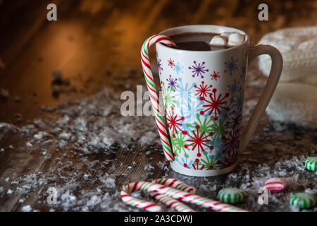 Mug of hot chocolate and candy canes. Stock Photo