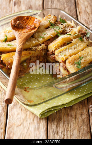 pastelon (puerto rican sweet plantain lasagna) close-up of a baking dish on a table. vertical Stock Photo