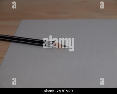 paper and pencils ,Placed on a wooden floor. Stock Photo