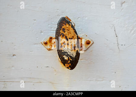 old rusted oval doorknob Stock Photo